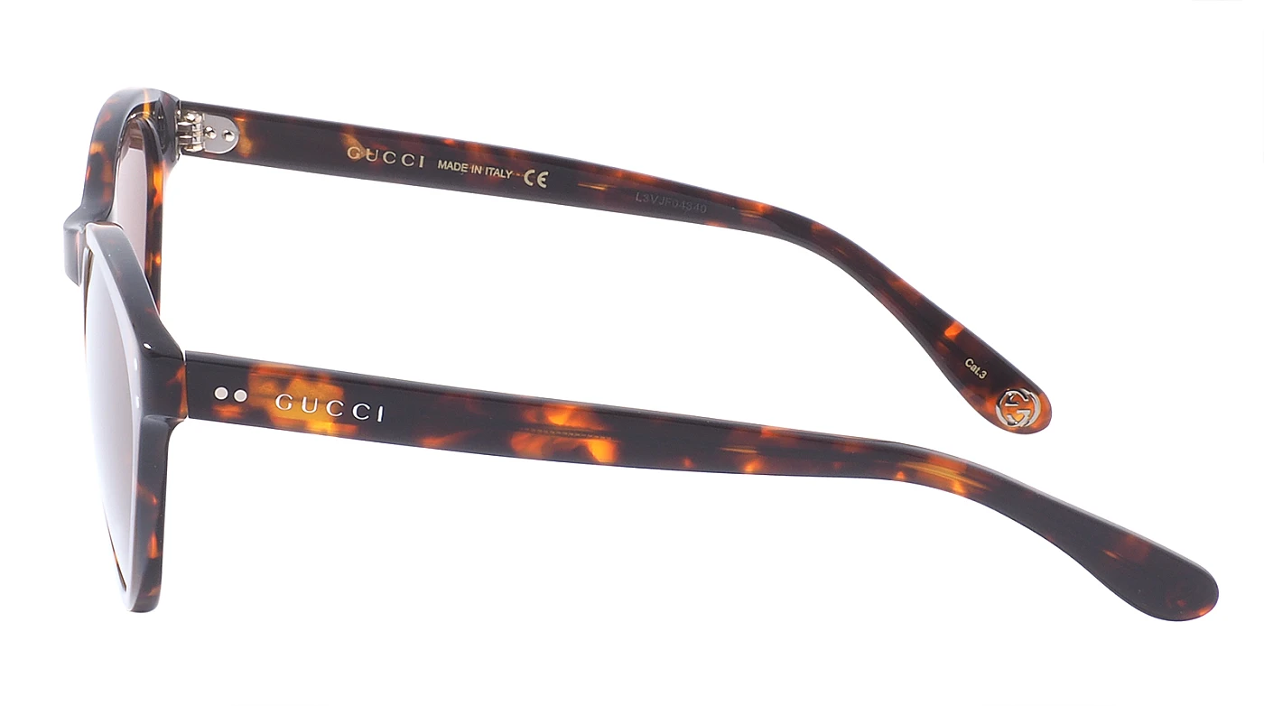 Женские солнцезащитные очки Gucci 0569S 002 фото 4